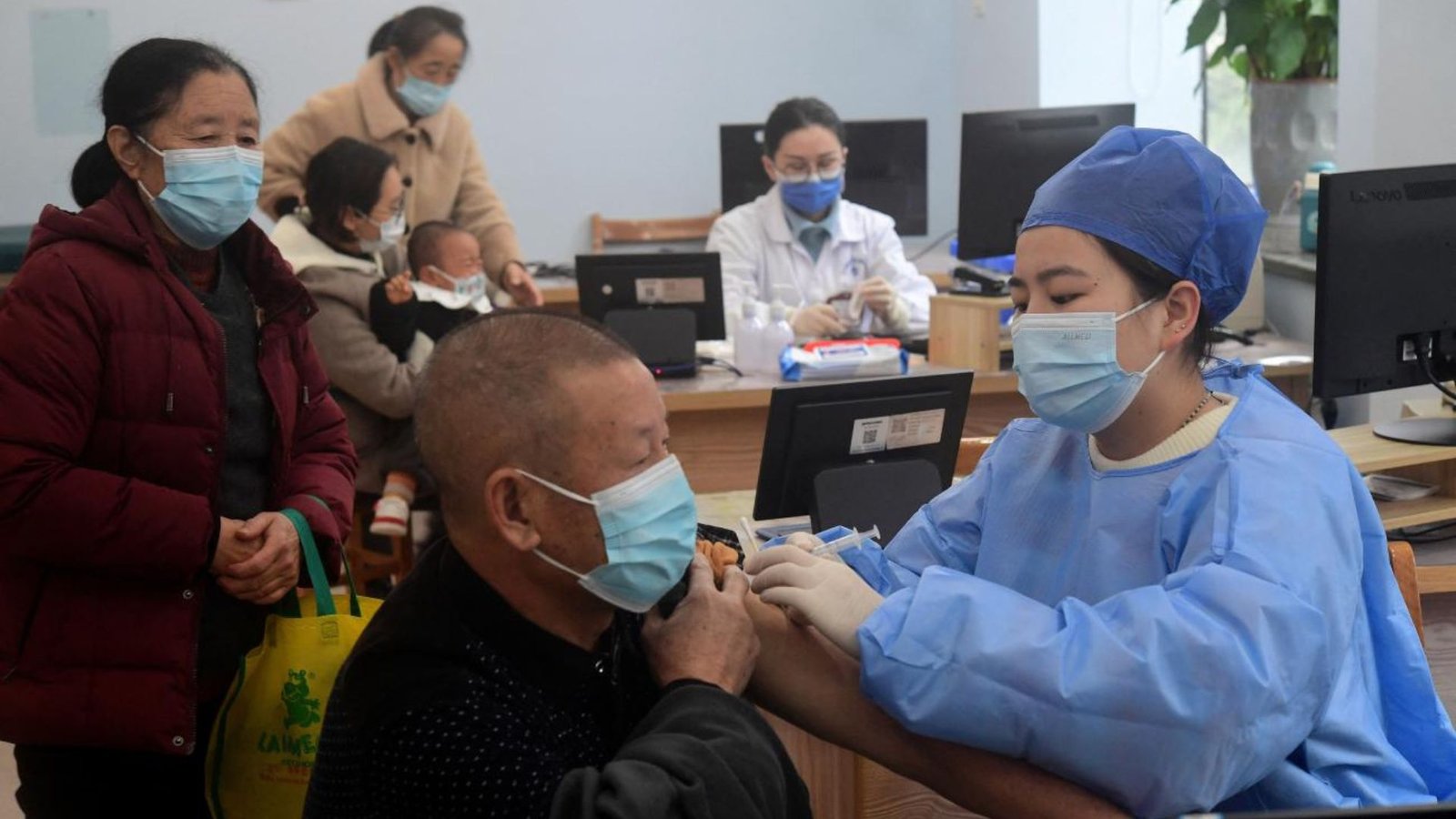 people being attended by community health workers in Fonni